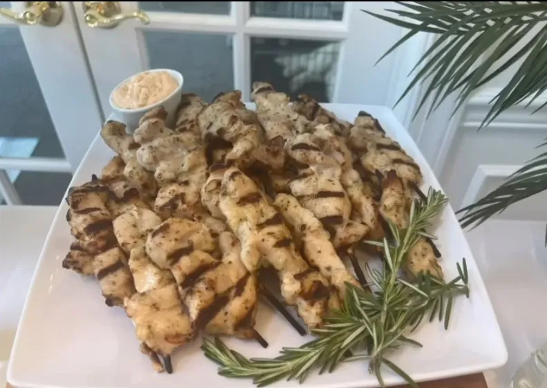 09-grilled-chicken-skewers-dip.jpg Grilled chicken skewers with a creamy dip and fresh rosemary